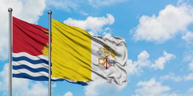 Kiribati ve Vatikan bayrağı birlikte beyaz bulutlu mavi gökyüzüne karşı rüzgarda sallayarak. Diplomasi kavramı, uluslararası ilişkiler.