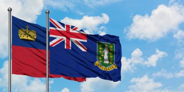 Liechtenstein ve İngiliz Virgin Adaları bayrağı birlikte beyaz bulutlu mavi gökyüzüne karşı rüzgarda sallayarak. Diplomasi kavramı, uluslararası ilişkiler.