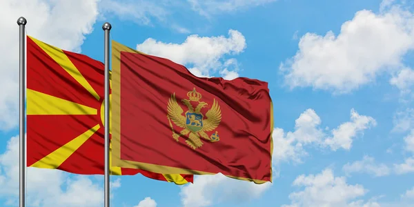 Bandera de Macedonia y Montenegro ondeando en el viento contra el cielo azul nublado blanco juntos. Concepto diplomático, relaciones internacionales . — Foto de Stock