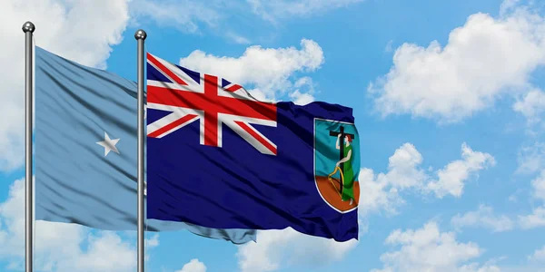 密克罗尼西亚和蒙特塞拉特国旗在风中飘扬，与白云相间的蓝天相一起。外交概念、国际关系. — 图库照片