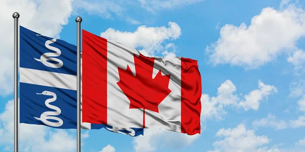 Martinica y la bandera de Canadá ondeando en el viento contra el cielo azul nublado blanco juntos. Concepto diplomático, relaciones internacionales . — Foto de Stock