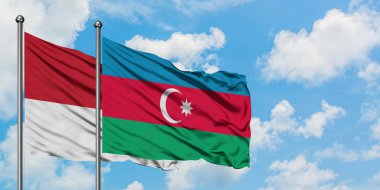 Monako ve Azerbaycan bayrağı havada havada sallanıyor. Diplomasi kavramı, uluslararası ilişkiler.