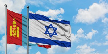 Moğolistan ve İsrail bayrağı birlikte beyaz bulutlu mavi gökyüzüne karşı rüzgarda sallayarak. Diplomasi kavramı, uluslararası ilişkiler.