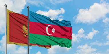 Karadağ ve Azerbaycan bayrağı havada havada sallanıyor. Diplomasi kavramı, uluslararası ilişkiler.