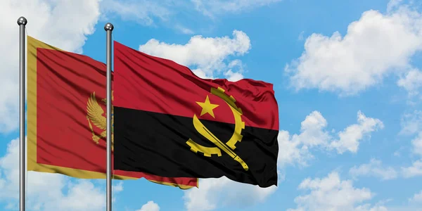 Bandera de Montenegro y Angola ondeando en el viento contra el cielo azul nublado blanco juntos. Concepto diplomático, relaciones internacionales . — Foto de Stock