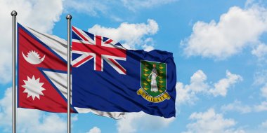 Nepal ve İngiliz Virgin Adaları bayrağı birlikte beyaz bulutlu mavi gökyüzüne karşı rüzgarda sallayarak. Diplomasi kavramı, uluslararası ilişkiler.