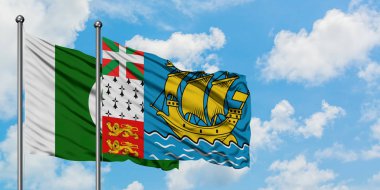 Pakistan ve Saint Pierre ve Miquelon bayrağı birlikte beyaz bulutlu mavi gökyüzüne karşı rüzgarda sallayarak. Diplomasi kavramı, uluslararası ilişkiler.