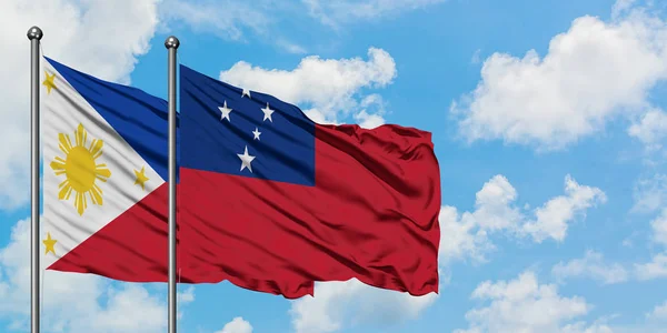 Philippines and Samoa flag waving in the wind against white cloudy blue sky together. Diplomacy concept, international relations. — Stock Photo, Image