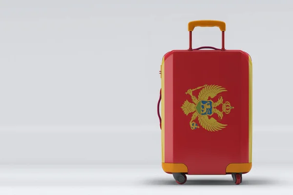Karadağ Renkli Arka Planda Şık Bir Bavul Üzerinde Bayrak Sallıyor — Stok fotoğraf
