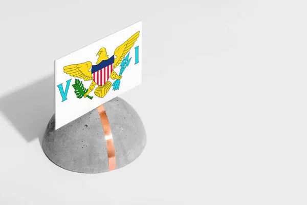 United States Virgin Islands flag tagged on rounded stone. White isolated background. Side view minimal national concept.