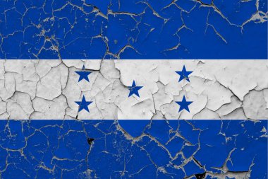 Honduras bayrağı kirli, hasarlı ve duvardaki çizikler yüzeyi görmek için boyayı soyuyor. Klasik Ulusal Konsept.