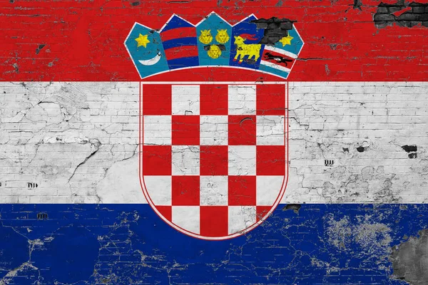 Croatia flag on grunge scratched concrete surface. National vintage background. Retro wall concept.