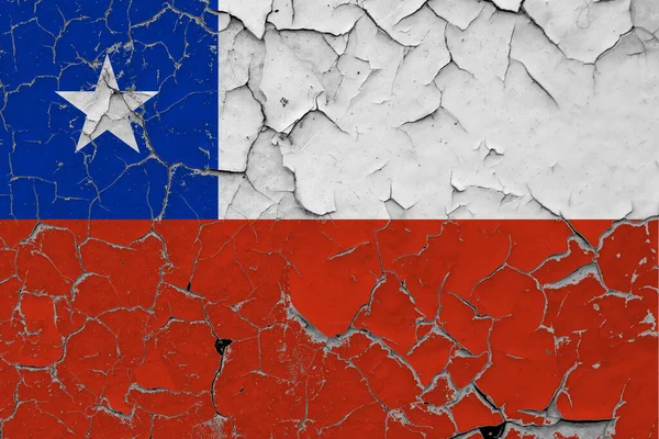 Chile flag close up grungy, damaged and scratched on wall peeling off paint to see inside surface. Vintage National Concept.