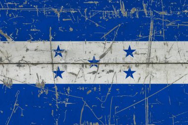 Çatlak kirli yüzeye Honduras bayrağı boyanmış. Klasik stil yüzeyinde ulusal model. Çizilmiş ve yıpranmış konsept.