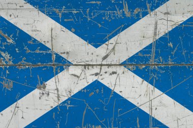 Çatlak kirli yüzeye İskoçya bayrağı çizilmiş. Klasik stil yüzeyinde ulusal model. Çizilmiş ve yıpranmış konsept.