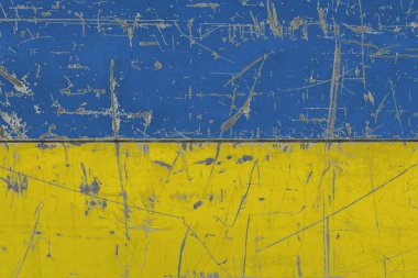 Çatlak kirli yüzeye Ukrayna bayrağı çizilmiş. Klasik stil yüzeyinde ulusal model. Çizilmiş ve yıpranmış konsept.