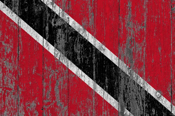 トリニダード トバゴの旗は木の表面に傷をつけました 国立ヴィンテージの背景 古い木製のテーブル傷フラグ表面 — ストック写真