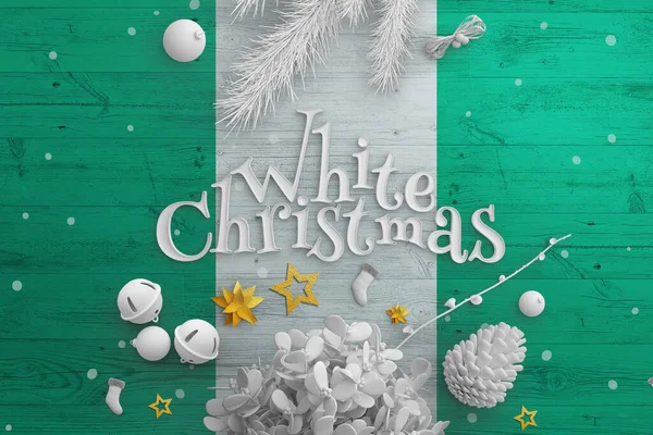 Nigeria flag on wooden table with White Christmas text. Christmas and new year background, celebration national concept with white decor.