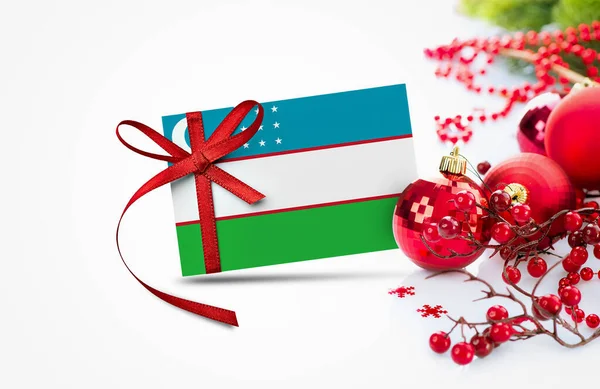 Oezbekistan Vlag Nieuwjaar Uitnodiging Kaart Met Rode Kerst Ornamenten Concept — Stockfoto