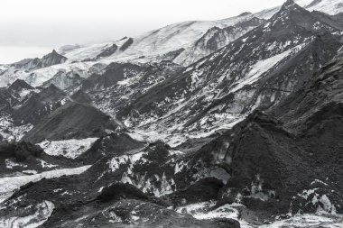 Solheimajokull kül gösterilen buzul İzlanda'daki buz üzerinde kazık.