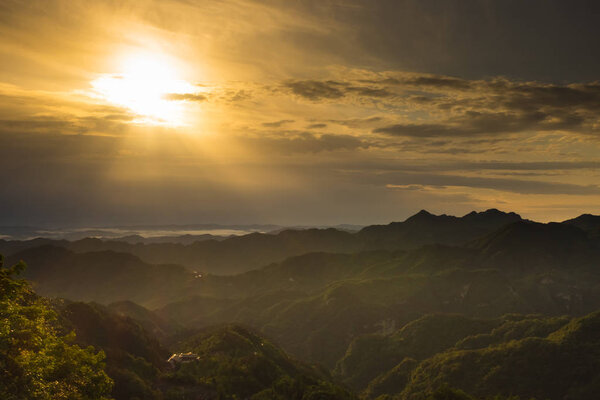 yellow calm sunrise on a Wudang mountain. The place where Dao was born
