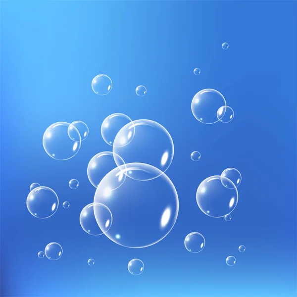 Реалістичний набір мильних бульбашок ізольований на синьому фоні. Векторна ілюстрація — стоковий вектор
