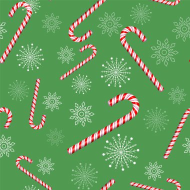 şeker kamışı bir yeşil arka plan neşeli Noel desenini sorunsuz. Kar taneleri