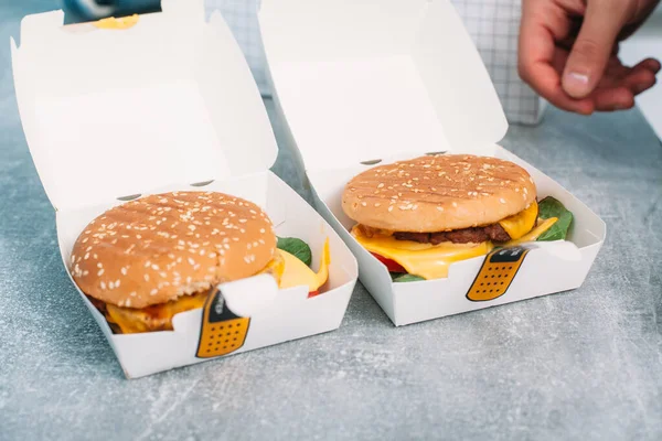 Vegan burgers in a paper box with food delivery.