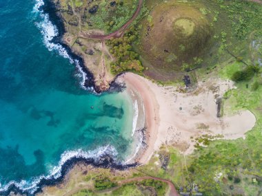 An aerial view to the north on the west coast of Easter Island at its town Hanga Roa viewing a wonderful coastline, Rapa Nui, Chile clipart