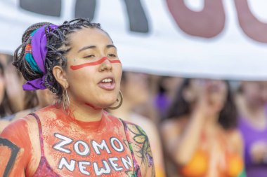 Women with body paint during Women`s Day 8M at Santiago de Chile City: Santiago Country: Chile Date: 8th March 2019  clipart