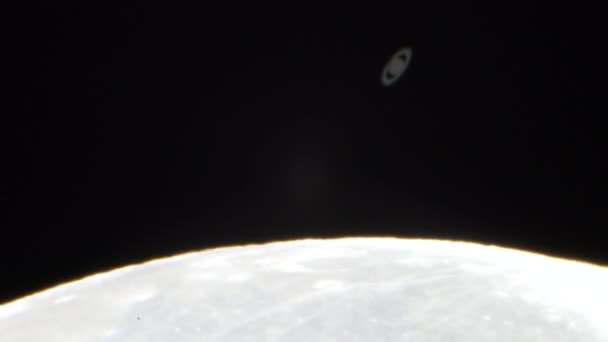 Moon Covers Saturn Planet — Stock Video