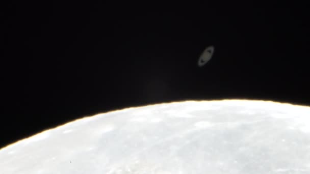 Moon Covers Saturn Planet — Stock Video