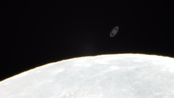 Moon Covers Saturn Planet — Stock Video