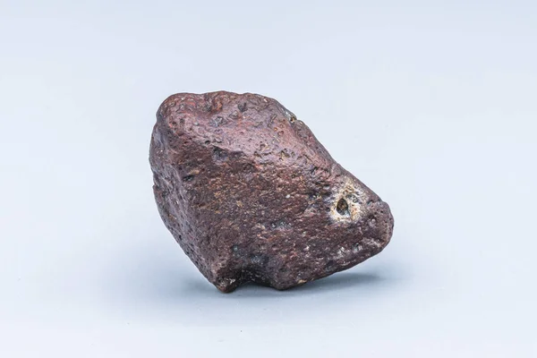 Meteoritenstück Auf Hintergrund — Stockfoto