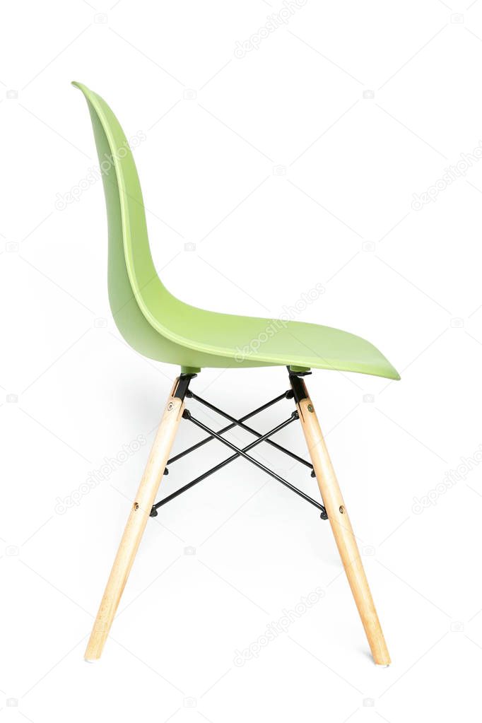 Green modern chair with wooden legs isolated on white background