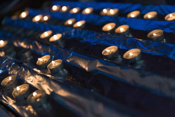 votive candles in the church