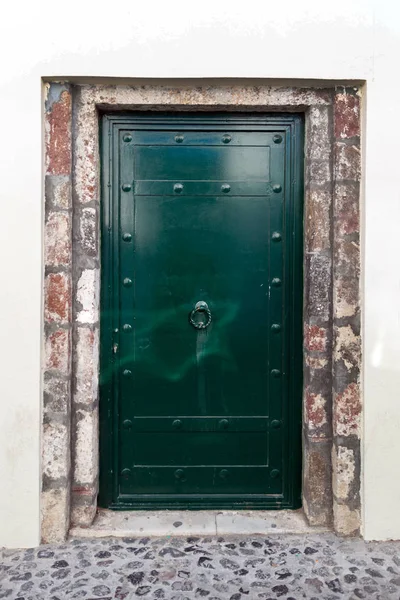 Green metal door