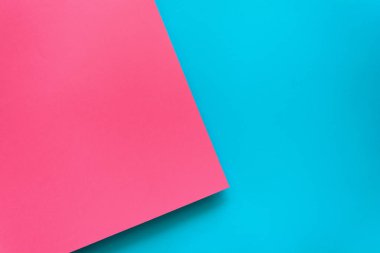 Mavi ve pembe pastel renk arka plan papered. Birim geometrik düz yatıyordu. Üstten görünüm. Kopya alanı