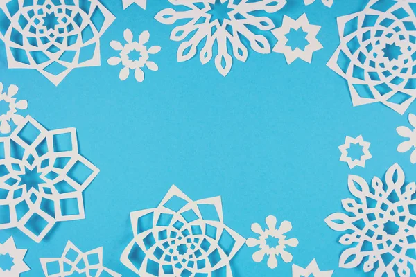 Paper Snowflakes Blue Background Top View Christmas Decoration — Stock Photo, Image