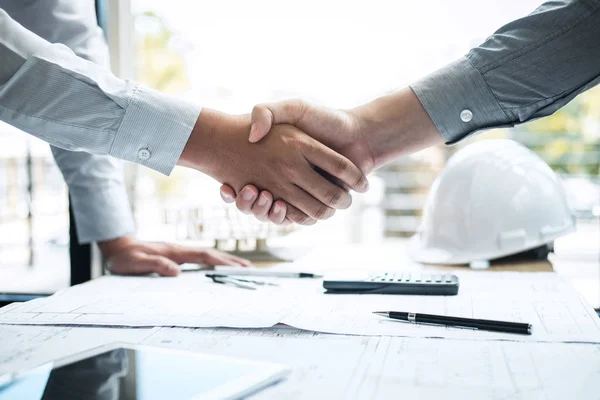 Handshake of collaboration, Construction engineering or architec