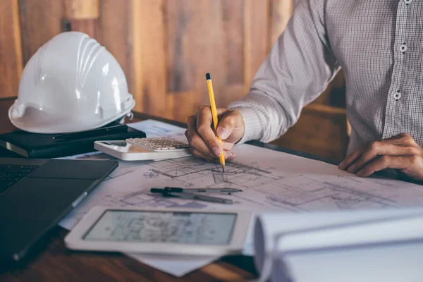 Construction engineering or architect hands working on blueprint — Stock Photo, Image