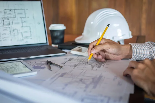 Construction engineering or architect hands working on blueprint — Stock Photo, Image