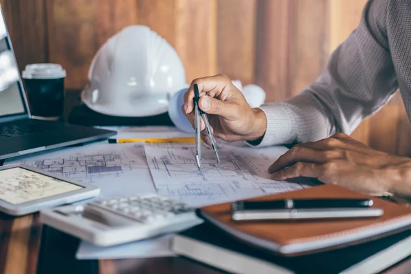 Construction engineering or architect hands working on blueprint — Stock Photo, Image