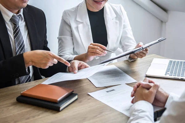 Employer or committee holding reading a resume with talking duri — Stock Photo, Image