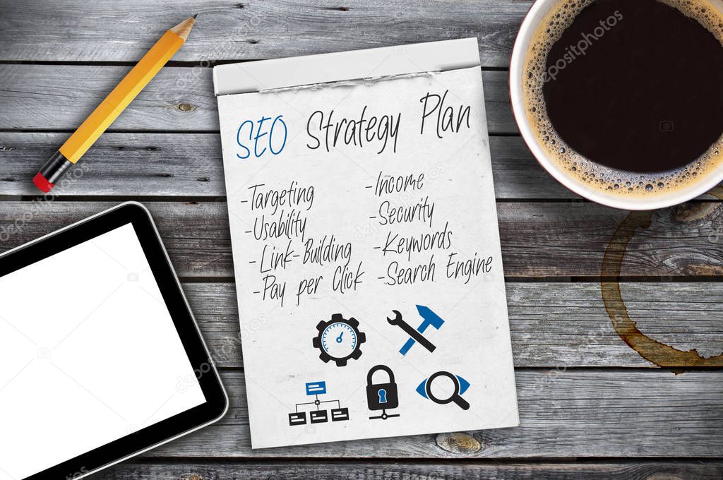 sketchbook with SEO Strategy plan on a desktop