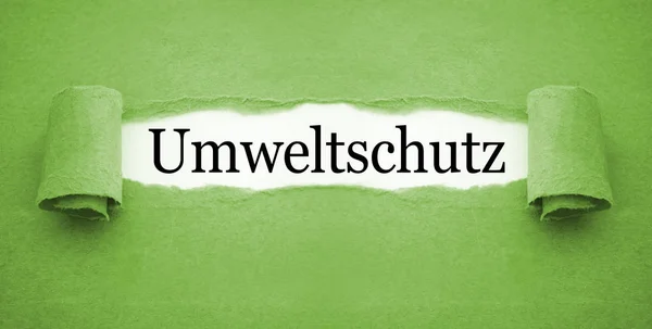 Paper work with the german word for environmental Protection - Umweltschutz