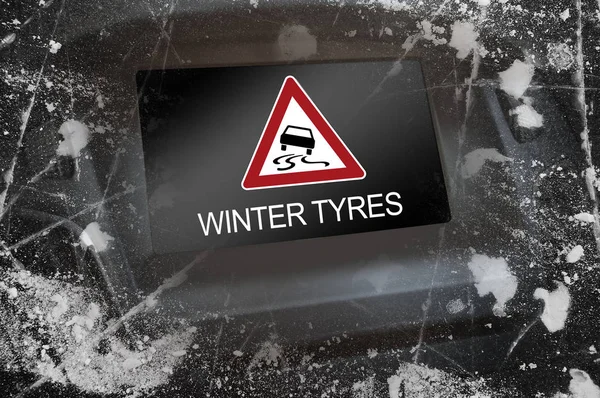 Display in the dashboard with attention winter tyres