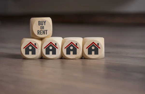 Cubes dice with buy or rent and house icons