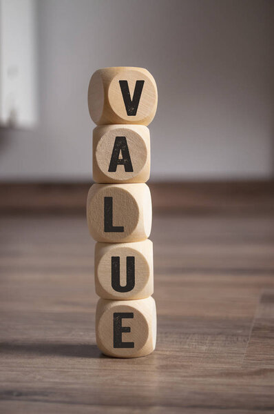 Cubes dice with value on wooden background