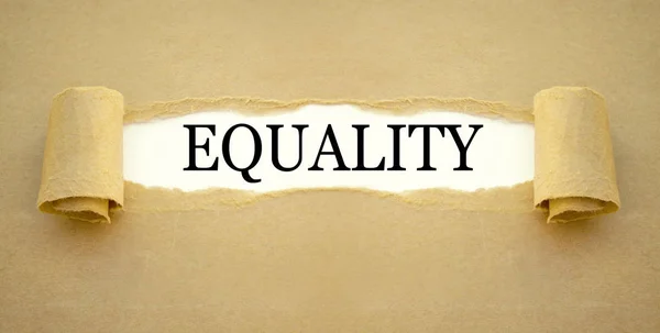 Brown paper work with the word equality